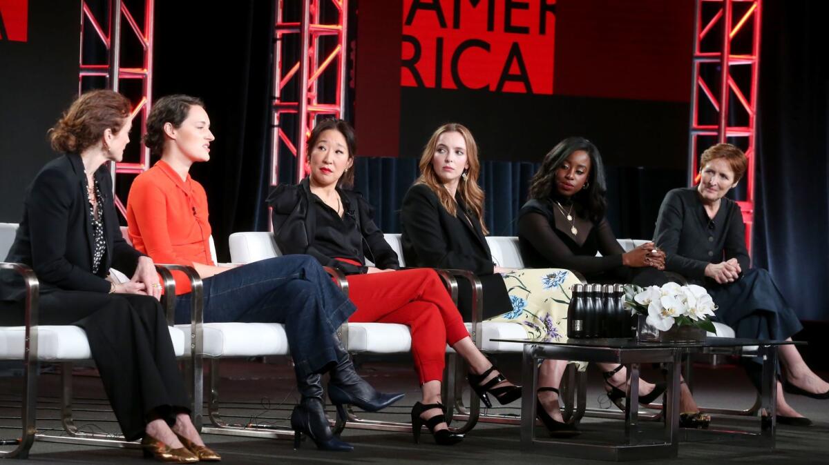 Executive producer Sally Woodward Gentle, left, Phoebe Waller-Bridge and actors Sandra Oh, Jodie Comer, Kirby Howell-Baptiste and Fiona Shaw of "Killing Eve" at the TCA winter press tour in Pasadena.