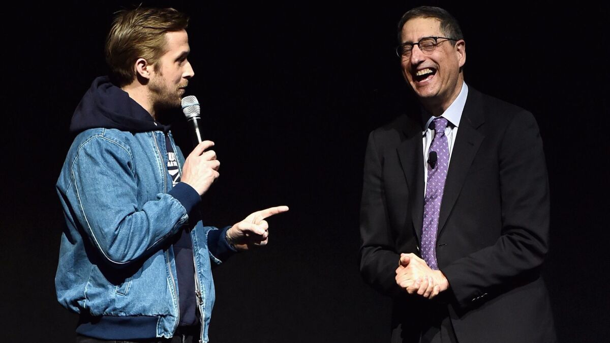 Ryan Gosling, left, interacts with Chairman of Sony Pictures Entertainment Tom Rothman onstage at the CinemaCon 2017 opening-night presentation of upcoming Sony Pictures, including "Blade Runner 2049," starring Gosling.