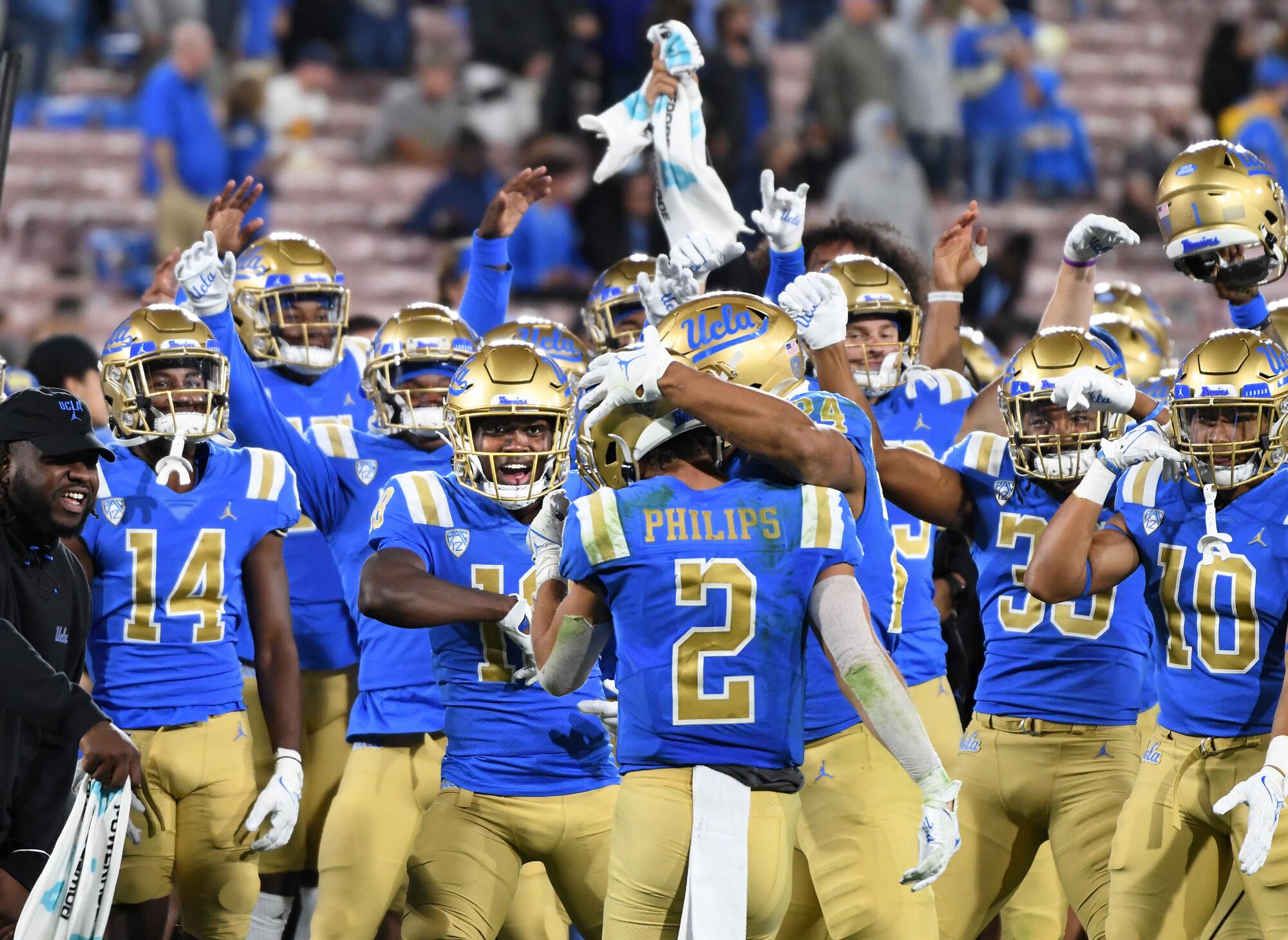  UCLA celebrate after a touchdown.