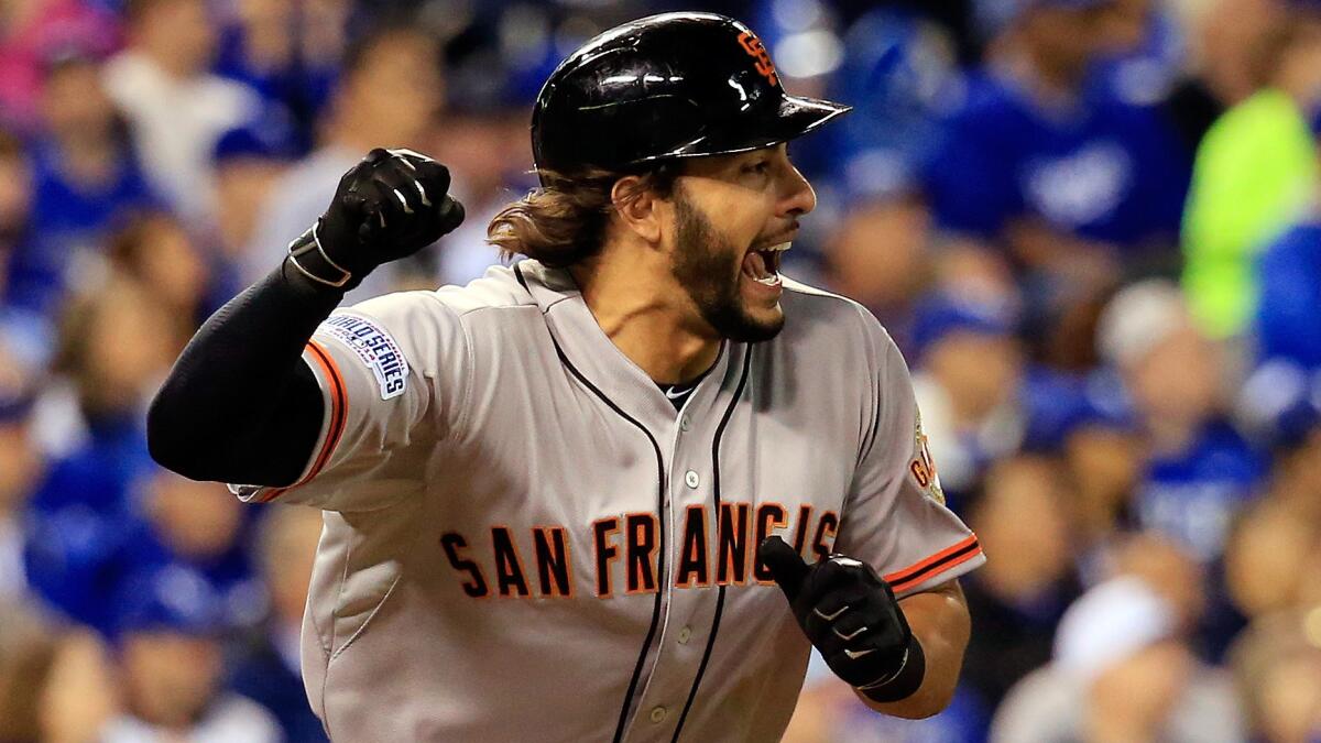 San Francisco Giants designated hitter Michael Morse celebrates after hitting a run-scoring single during the fourth inning of a 7-1 win over the Kansas City Royals in Game 1 of the World Series.