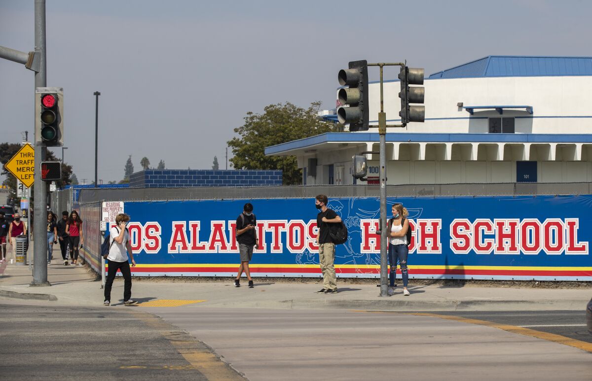 Students on sidewalk outside Los Alamitos High School