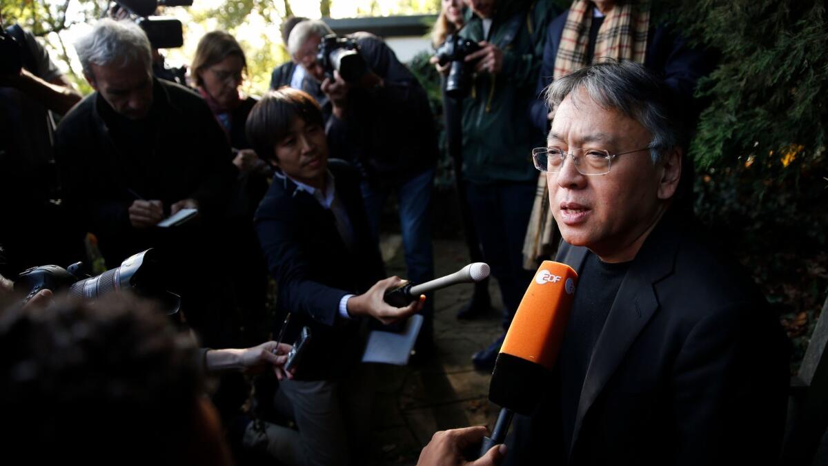 Kazuo Ishiguro speaks to the news media after winning the Nobel Prize in Literature.