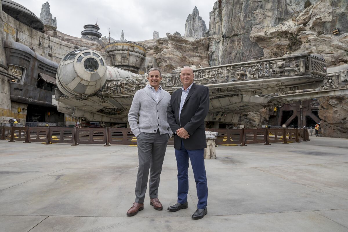 Walt Disney Co. Executive Chairman Bob Iger and Chief Executive Bob Chapek pictured at Disneyland's Star Wars: Galaxy's Edge.