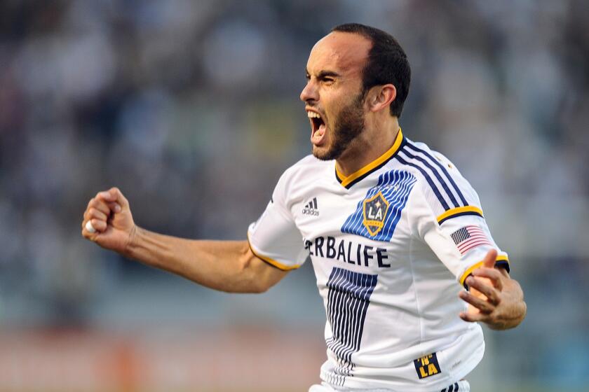 Galaxy midfielder Landon Donovan reacts after scoring the first of his three goals against Real Salt Lake in an MLS playoff game on Sunday at StubHub Center.