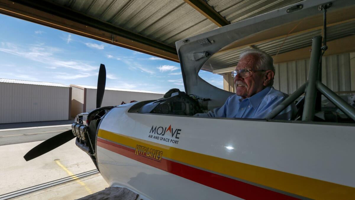 Ralph Wise is shown at the Mojave Air and Space Port with Snort, the seventh and last plane he built.