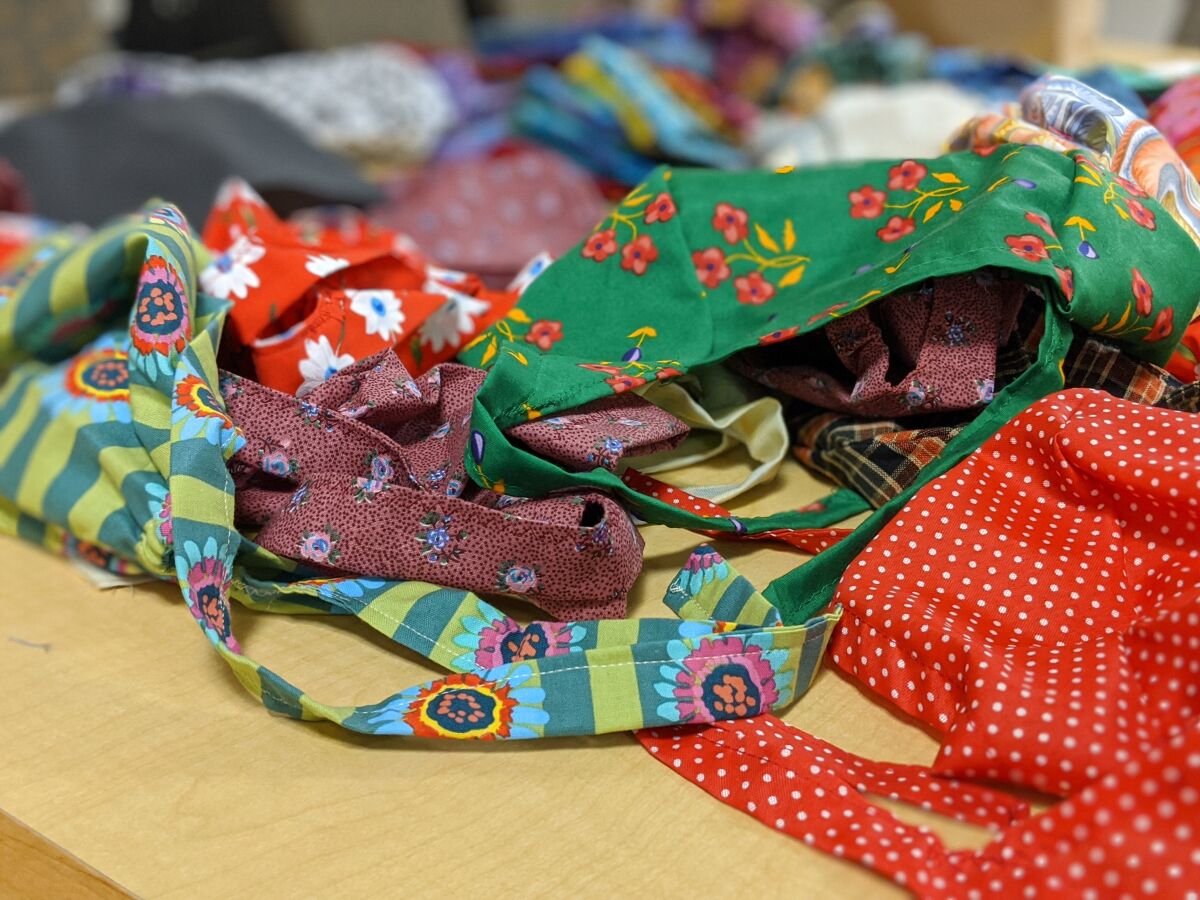 Surgical scrub caps made by Scripps volunteers come in a variety of colors and patterns.
