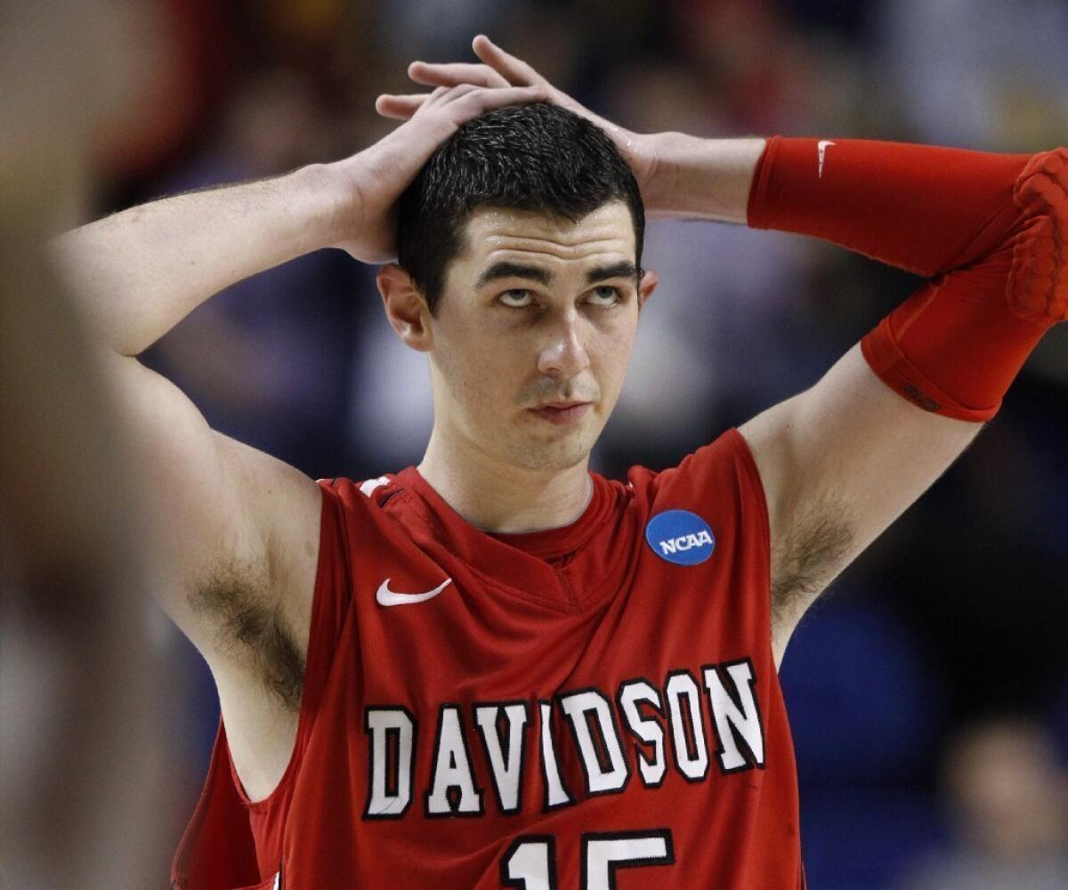 Davidson forward Jake Cohen wasn't happy to lose to Marquette in the NCAA college basketball tournament, but the Davidson College math majors are doing well in picking the brackets for the Sweet 16.