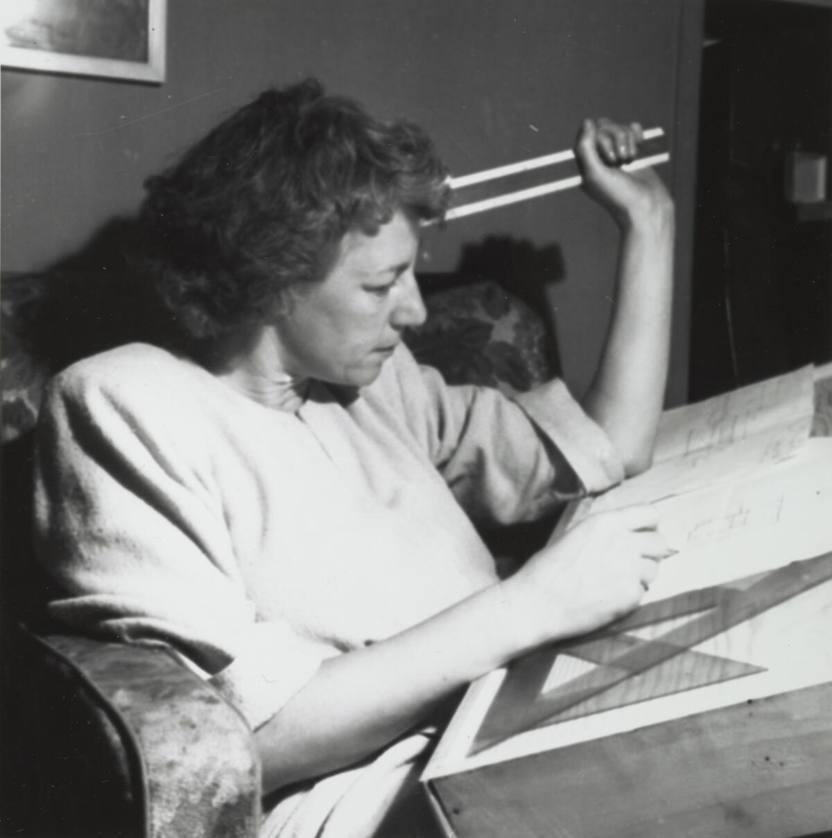 Esther McCoy at her drafting board in the mid-1940s. (Courtesy of Esther McCoy Papers / Archives of American Art / Smithsonian Institution.)