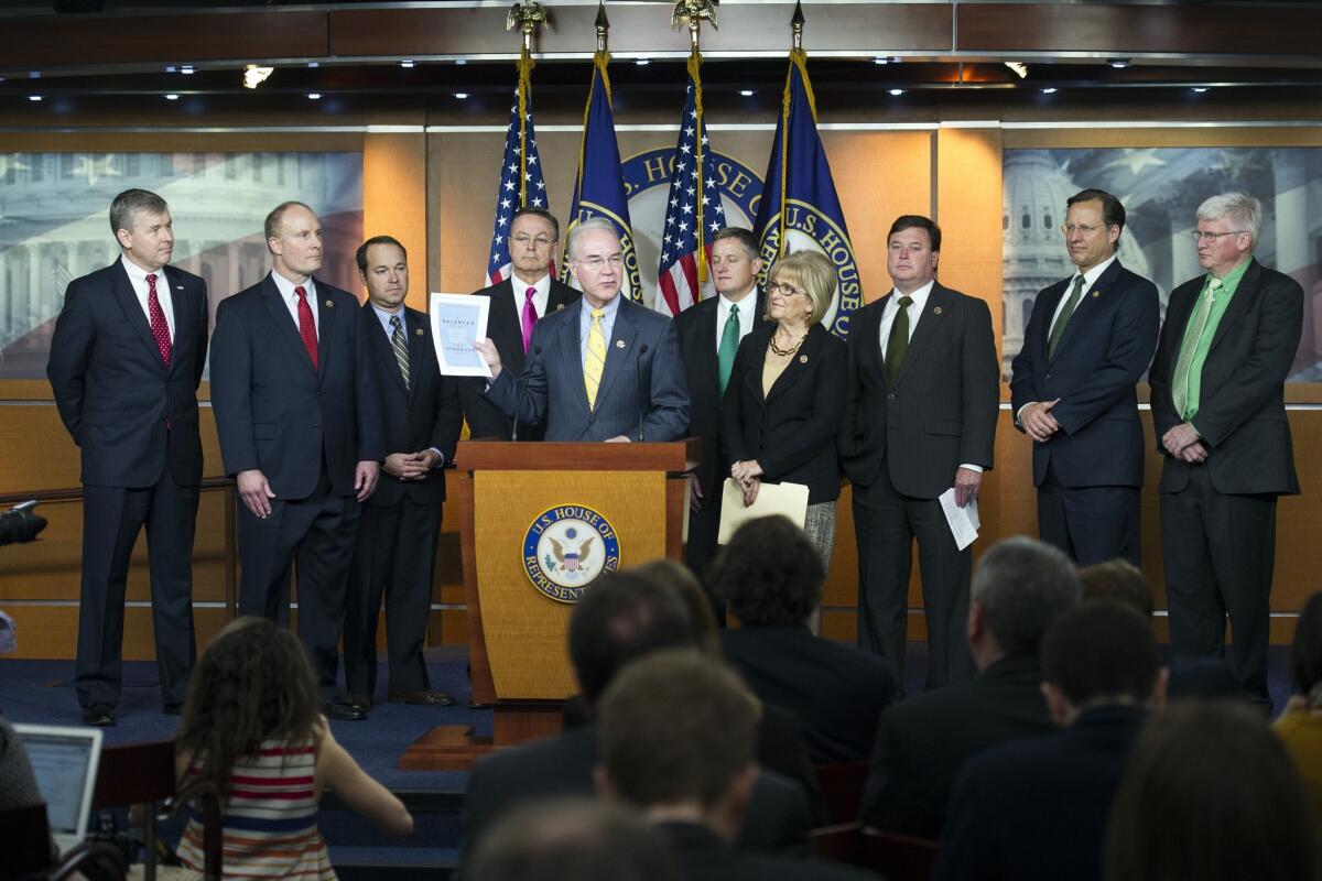 House Budget Committee Chairman Tom Price (R-Ga.), center, along with GOP members of the committee, announces the House Republican budget proposal.