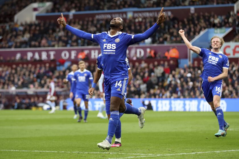 Leicester City's Kelechi Iheanacho celebrates scoring his side's second goal, during the English Premier League soccer match between Aston Villa and Leicester City, at Villa Park, in Birmingham, England, Saturday, Feb. 4, 2023. (Isaac Parkin/PA via AP)