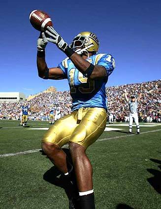 UCLA tight end Marcedes Lewis (19) celebrates catching a two-point conversion against Northwestern during the second quarter of the Sun Bowl college football game in El Paso.