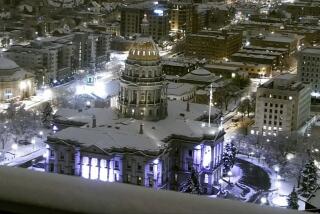 Please see this frame grab showing The Colorado State Capitol is covered in snow early Thrusday, March 14, 2024 in Denver. A major snowstorm has hit Colorado, closing numerous schools and government offices Thursday and shutting down sections of highways leading to the Denver area as meteorologists warned of difficult to nearly impossible travel. (KMGH via AP)