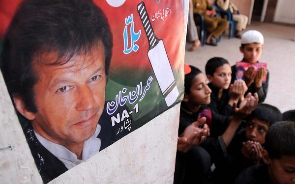 Boys in Peshawar, Pakistan, pray for the recovery of cricketer-turned-politician Imran Khan after he was injured in a fall at a campaign rally.