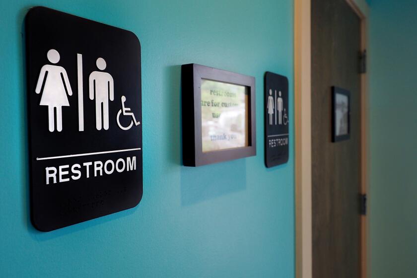 DURHAM, NC - MAY 10: Unisex signs hang outside bathrooms at Toast Paninoteca on May 10, 2016 in Durham, North Carolina. Debate over transgender bathroom access spreads nationwide as the U.S. Department of Justice countersues North Carolina Governor Pat McCrory from enforcing the provisions of House Bill 2 (HB2) that dictate what bathrooms transgender individuals can use. (Photo by Sara D. Davis/Getty Images) ** OUTS - ELSENT, FPG, CM - OUTS * NM, PH, VA if sourced by CT, LA or MoD **
