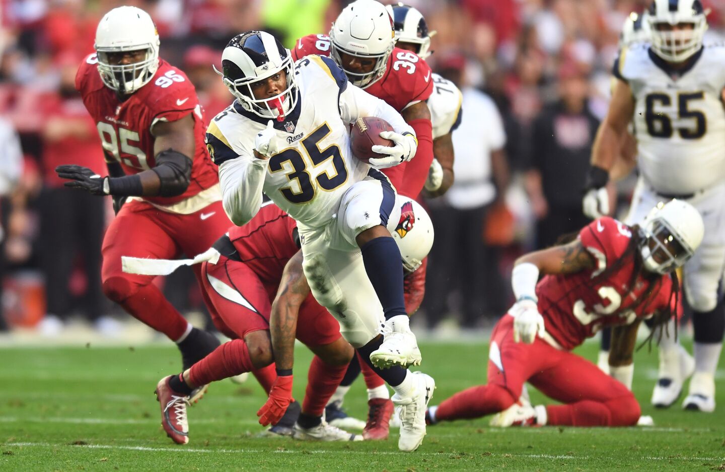 Rams running back C.J. Anderson picks up big yards against the Arizona Cardinals in the second quarter at State Farm Stadium on Sunday in Glendale, Ariz.