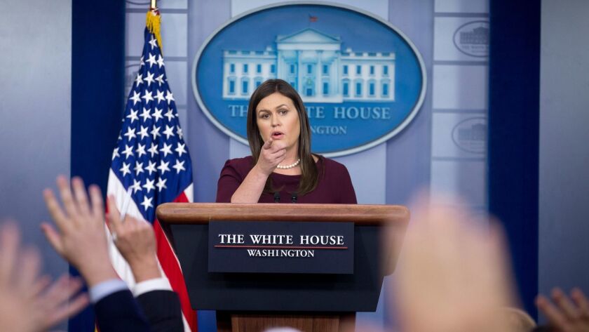 White House Press Secretary Sarah Huckabee Sanders takes questions from the media at the White House on Aug. 14.