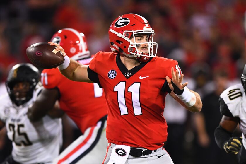 ATHENS, GA - OCTOBER 6: Jake Fromm #11 of the Georgia Bulldogs passes against the Vanderbilt Commodores on October 6, 2018 at Sanford Stadium in Athens, Georgia. (Photo by Scott Cunningham/Getty Images)