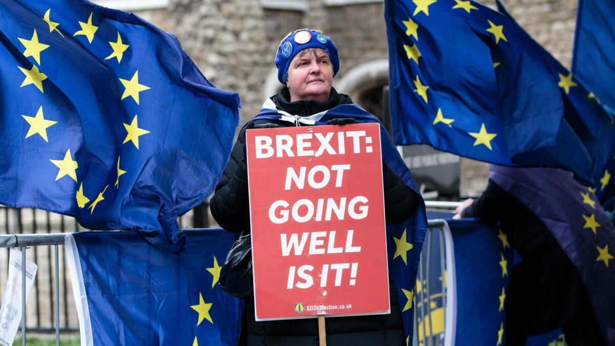 An anti-Brexit protester outside Parliament in London on March 13.