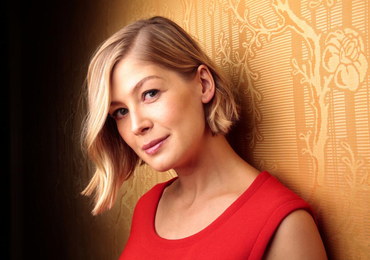 "Gone Girl" star Rosamund Pike is in talks to join Christian Bale in "The Deep Blue Good-by."