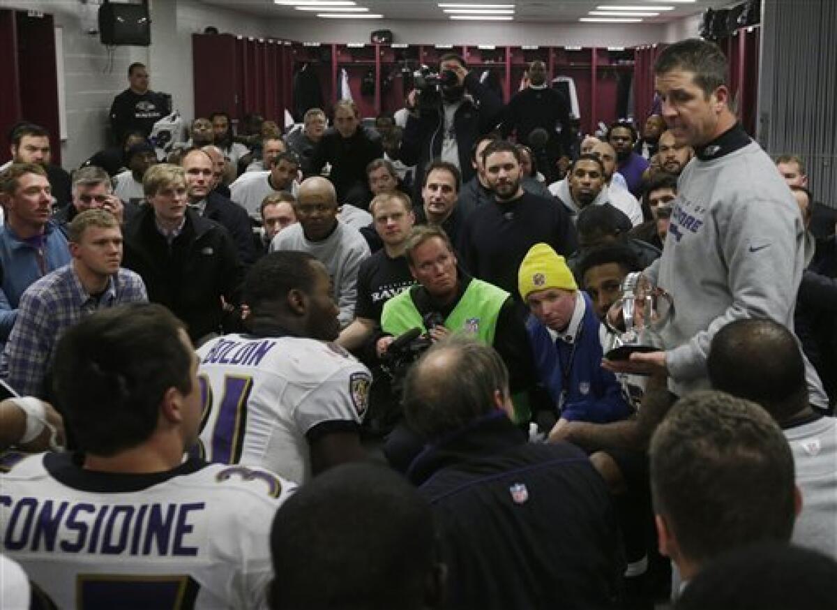 Baltimore Ravens Joe Flacco reacts with Vonta Leach after throwing a 3 yard  touchdown pass in the fourth quarter against the New England Patriots in  the AFC Championship Game at Gillette Stadium