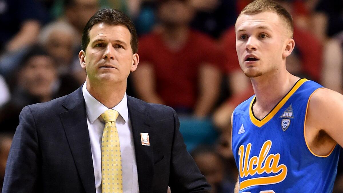 Coach Steve Alford and point guard Bryce Alford, shown during a game last year, opened the season with a loss to Monmouth on Friday night.