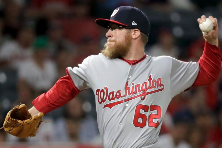Washington Nationals relief pitcher Sean Doolittle throws against the Los Angeles Angels during the ninth inning of a baseball game in Anaheim, Calif., Tuesday, July 18, 2017. The Nationals won 4-3. (AP Photo/Chris Carlson)