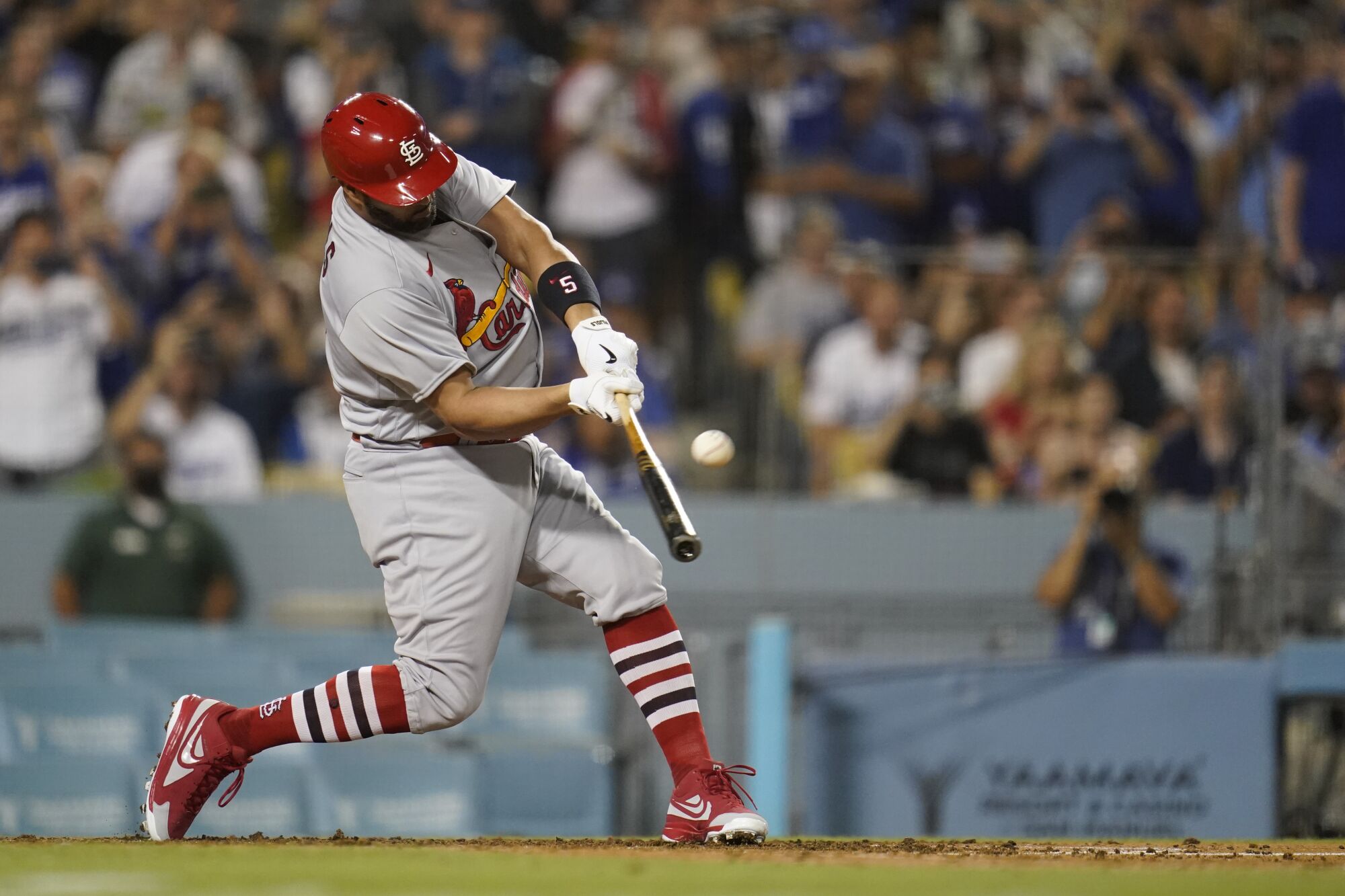St. Louis Cardinals designated batter Albert Pujols hits a home run.