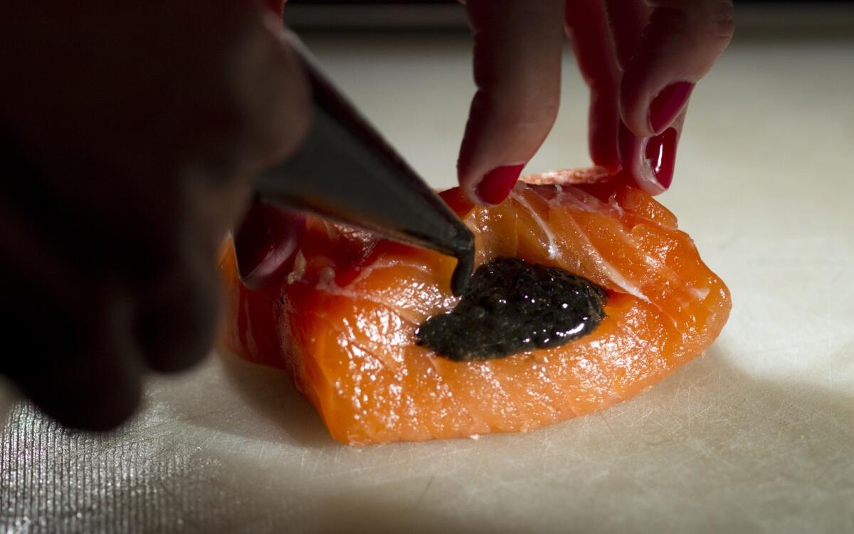 Confit of salmon with pressed caviar and brown butter-Meyer lemon hollandaise