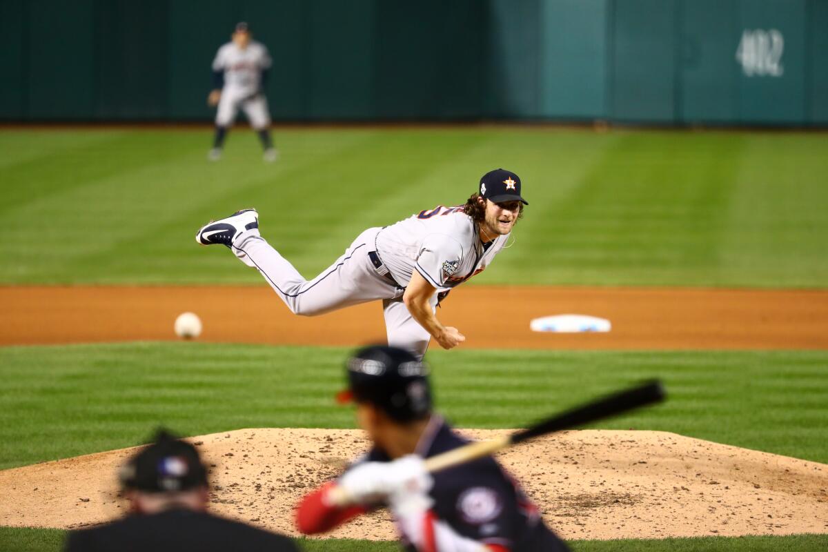 Houston Astros starter Gerrit Cole delivers against the Washington Nationals in Game 5 of the World Series on Sunday.