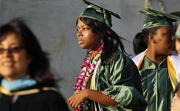 Khadijah Williams looks out toward the crowd at her graduation.