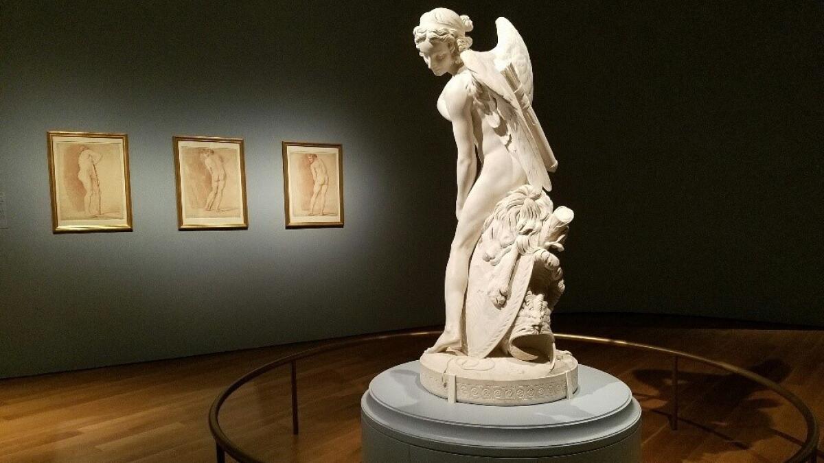 Edmé Bouchardon's "Cupid Carving a Bow From Hercules' Club," 1745-50, at the Getty Museum.