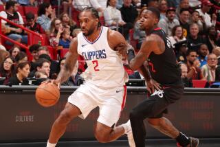 MIAMI, FL - FEBRUARY 4: Kawhi Leonard #2 of the LA Clippers dribbles the ball during the game.