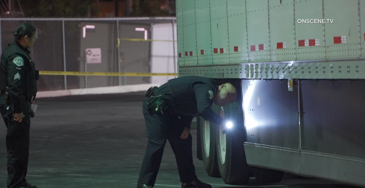 LAPD officers inspect a big rig