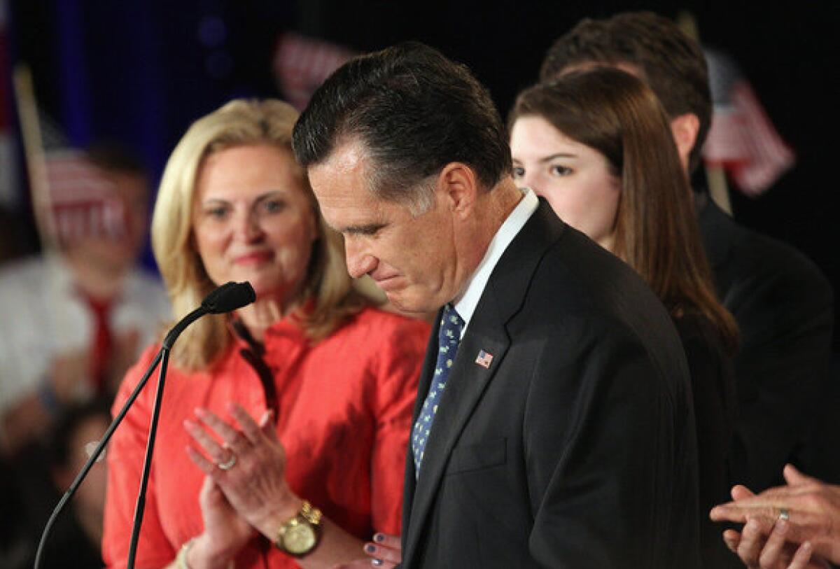 Mitt Romney appears with his wife, Ann, at his primary night rally in Columbia, S.C.