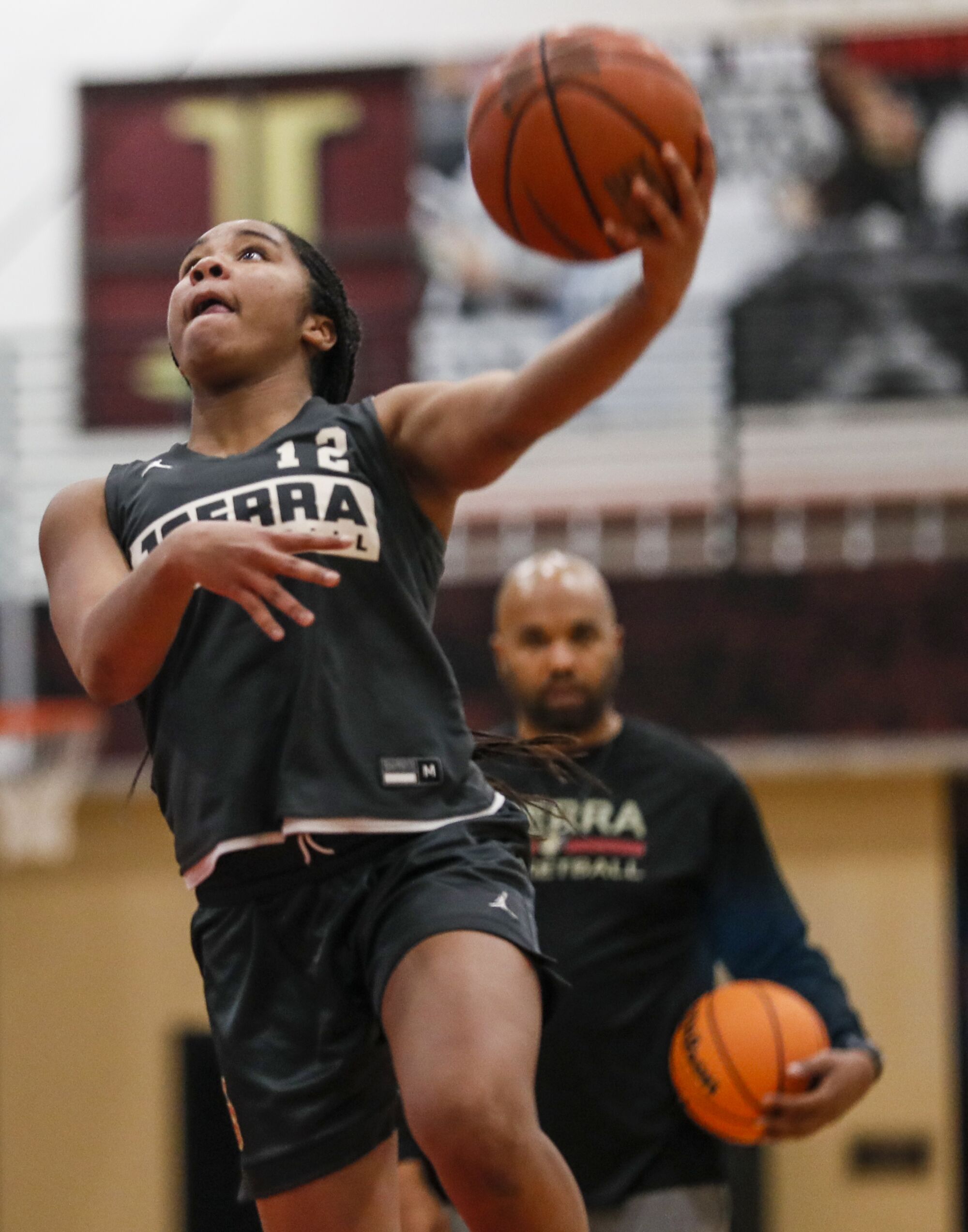 JSerra High's Jailynn Clayton jumps to shoot ball