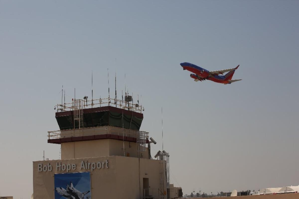 A jet takes off from Bob Hope Airport in Burbank. City and airport officials are seeking a mandatory nighttime curfew for landings and takeoffs at the airport.