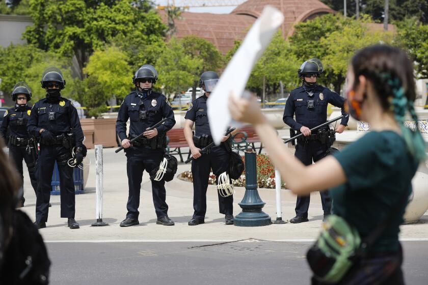 Youth protesters peacefully march through Balboa Park on June 1, 2020. They were protesting police brutality and the recent death of George Floyd.