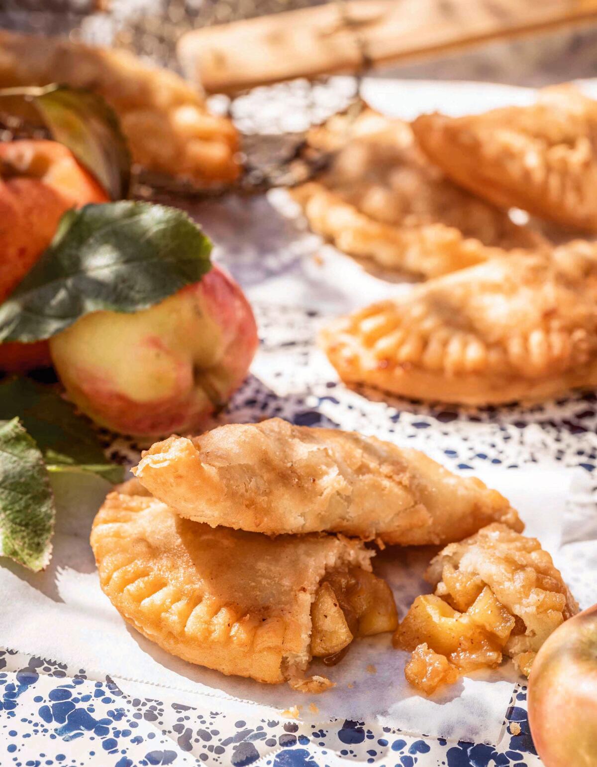 This cover image released by Mariner Books shows a recipe titled "Jack's Fried Pies," from the cookbook "Trisha’s Kitchen: Easy Comfort Food for Friends and Family” by Trisha Yearwood. (Ben Fink/Mariner Books via AP)