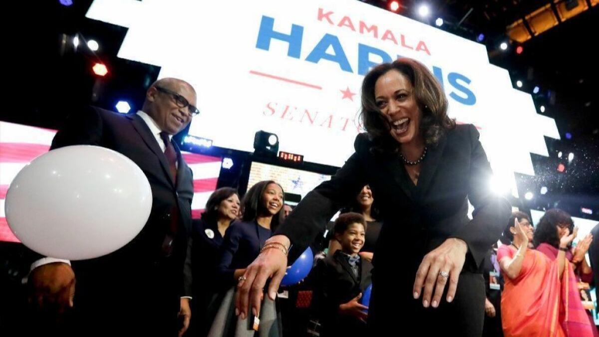 Then-California Atty. Gen. Kamala Harris greets supporters at an election-night rally for her Senate candidacy on Nov. 9, 2016.