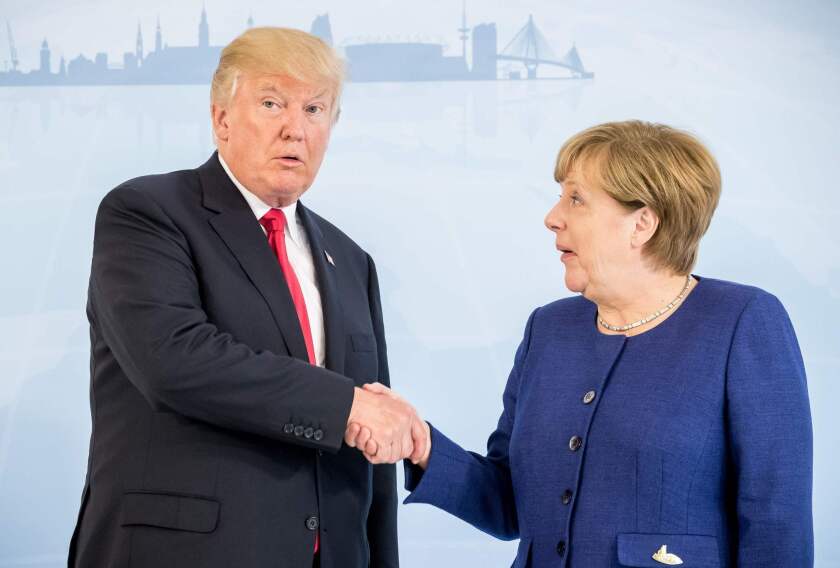 President Trump shakes hands with German Chancellor Angela Merkel prior to the Group of 20 summit in Hamburg, Germany, on July 6, 2017.