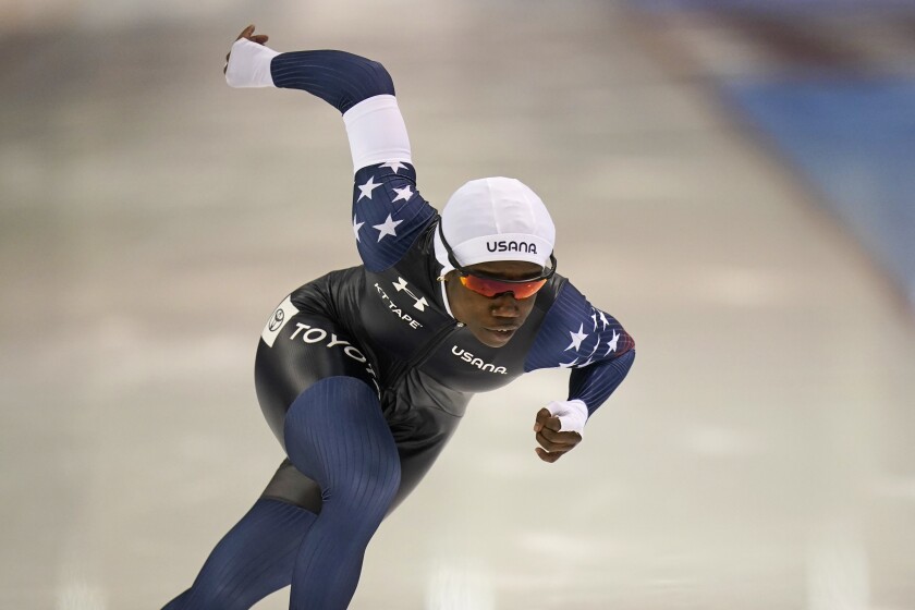 Erin Jackson, of the United States, skates during the women's 500 meters World Cup speedskating race at the Utah Olympic Oval Friday, Dec. 3, 2021, in Kearns, Utah. (AP Photo/Rick Bowmer)