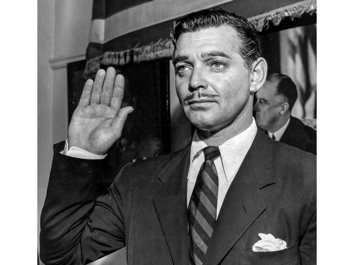 Aug. 12, 1942: Clark Gable takes the oath as an Army private in Los Angeles.