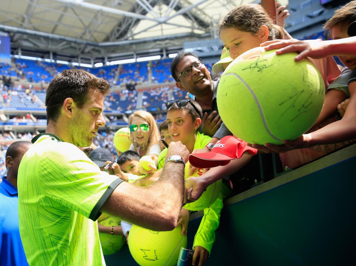 Juan Martin del Potro signs autographs for fans on Day 8 of the 2016 U.S. Open at the USTA National Tennis Center on Sept. 5.