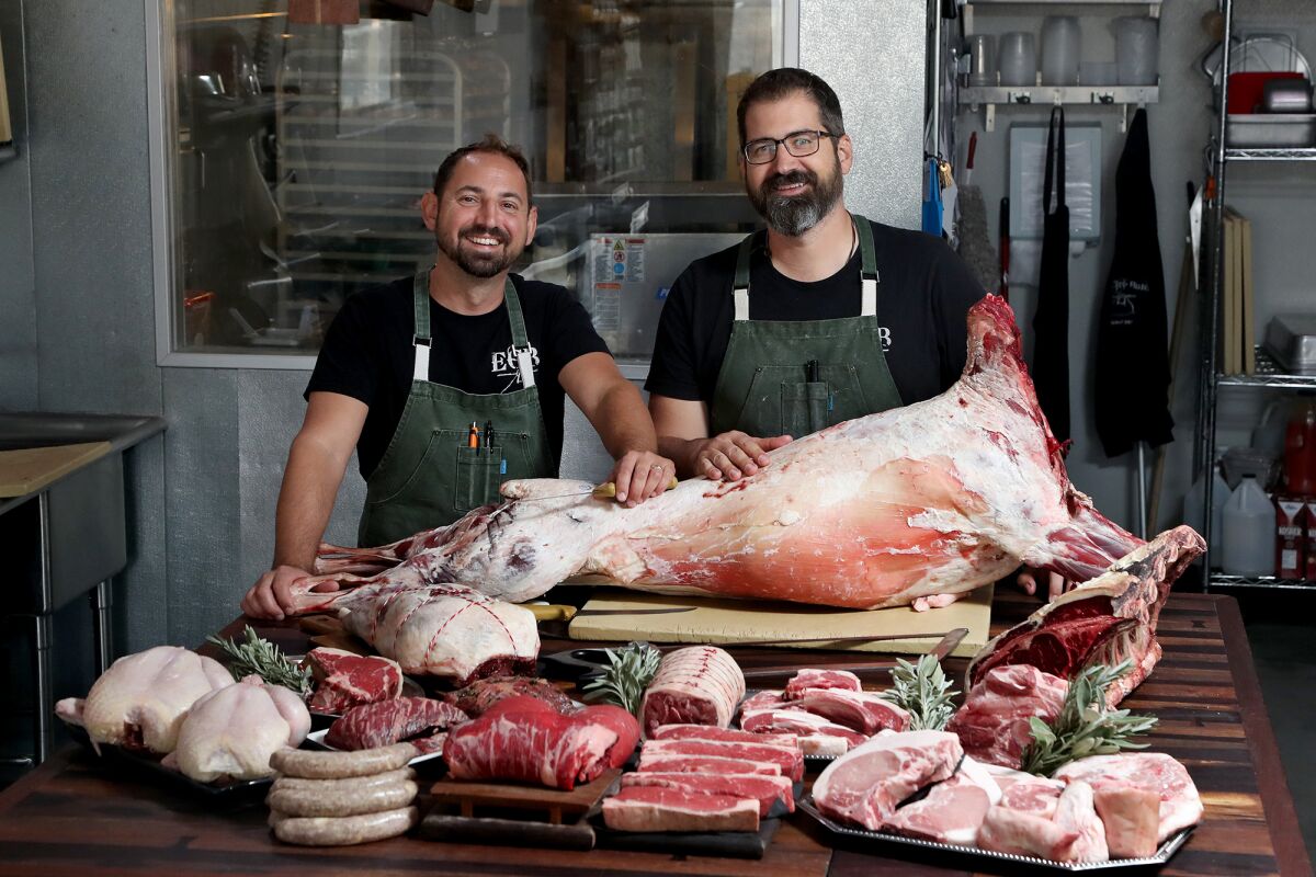 Chef Michael Puglisi, left, and CEO Steve Sabicer at Electric City Butchert.