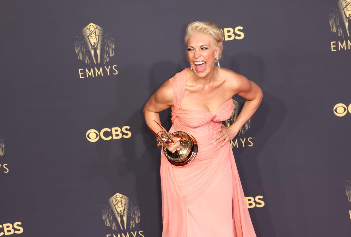 Hannah Waddingham holds a trophy during the Emmys