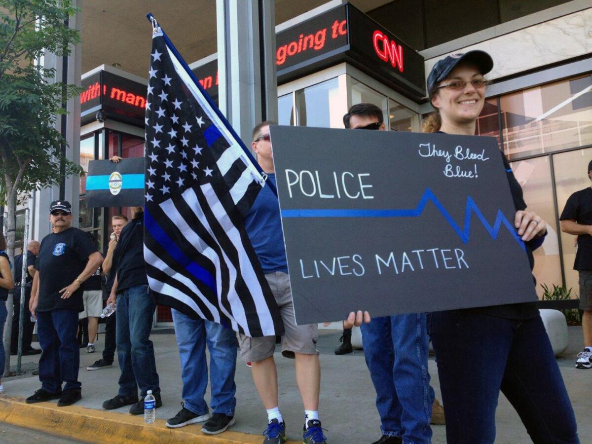 Annie Bergin, 34, of Los Angeles was among 100 people who gathered in Hollywood on Saturday to show support for police officers.
