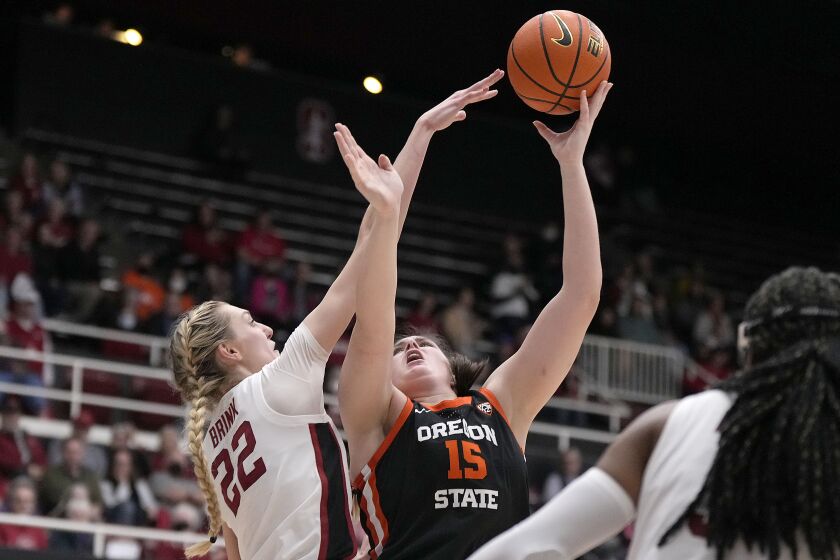 Oregon State forward Raegan Beers (15) shoots over Stanford forward Cameron Brink (22) during the second half of an NCAA college basketball game Friday, Jan. 27, 2023, in Stanford, Calif. Stanford won 63-60. (AP Photo/Tony Avelar)