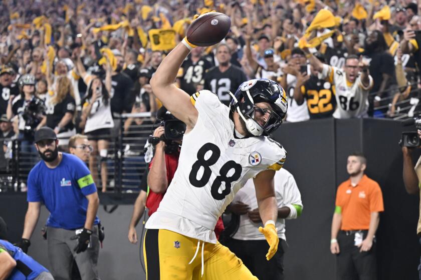 Pittsburgh Steelers tight end Pat Freiermuth celebrates after catching a touchdown during the second half of an NFL football game against the Las Vegas Raiders Sunday, Sept. 24, 2023, in Las Vegas. (AP Photo/David Becker)