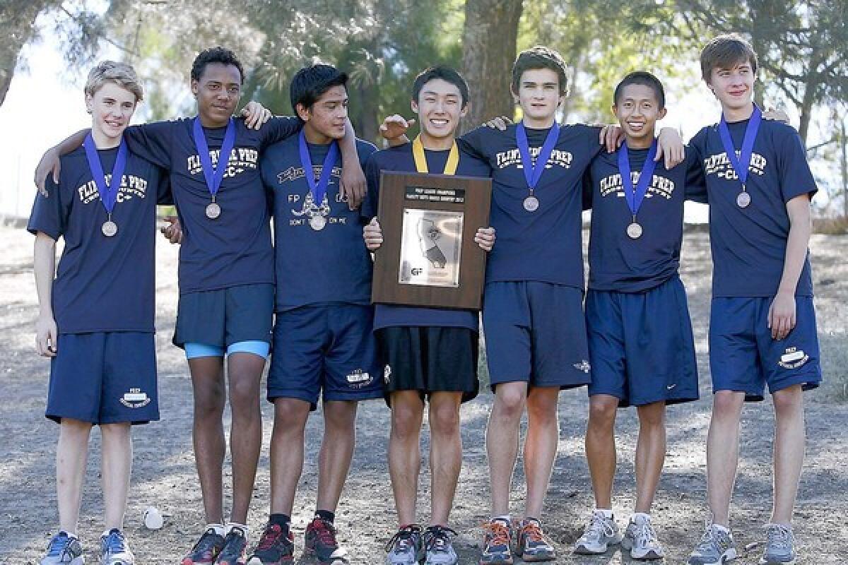 The Flintridge Prep boys' cross-country team, led by Aaron Sugimoto, center, won its 20th Prep League title over the past 21 seasons Saturday.