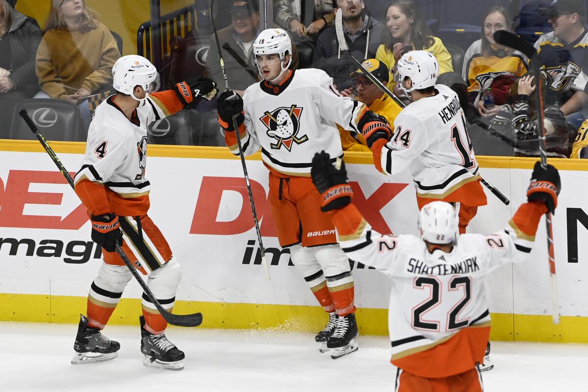 Ducks right wing Troy Terry celebrates with teammates after tying the score during the third period.